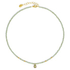 Halskette Mariela von BERND WOLF aus 24-Karat-goldplattiertem Sterlingsilber mit Peridot, Designlinie Aqua.