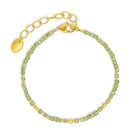 Armkette Cuseni von BERND WOLF aus 24-Karat-goldplattiertem Sterlingsilber mit Peridot, Designlinie Cubes.