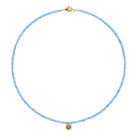 Kette mit Anhänger Solena von BERND WOLF aus 14-Karat-Gold mit Topas blau, Designlinie Soleil.