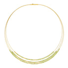Collier Clinifa von BERND WOLF aus 24-Karat-goldplattiertem Sterlingsilber mit Peridot, Designlinie Cleopatra.